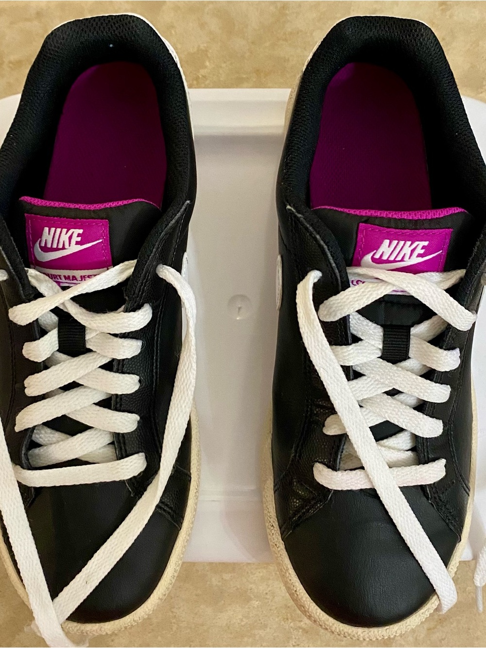Nike Women’s Black Leather
Sneakers with Pink Tongue and White Laces